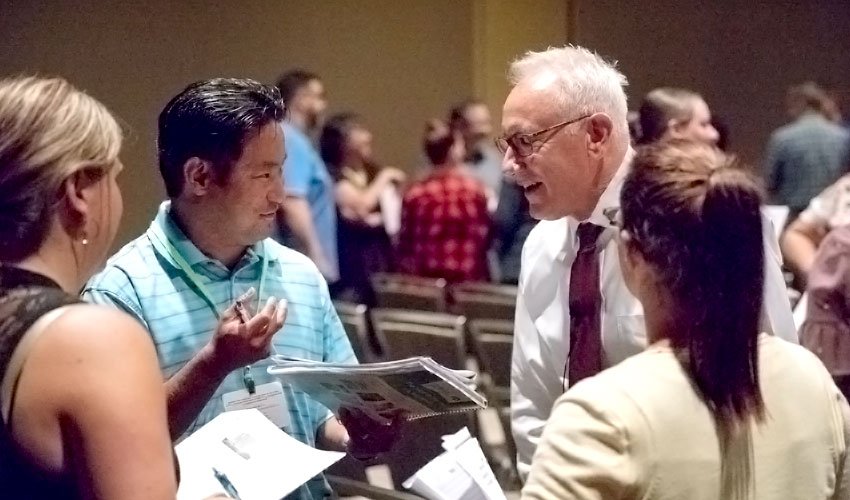 Tim Brown meeting with educators